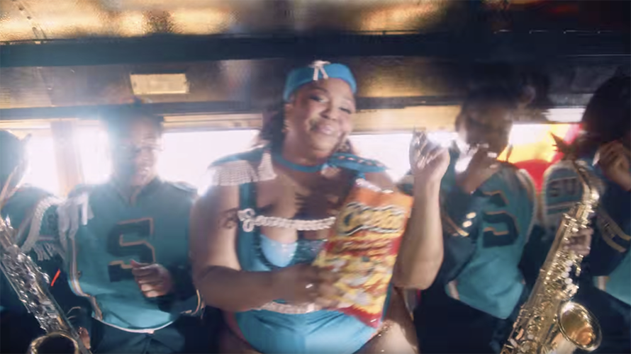 Why Lizzo Is Eating Cheetos in Her Latest Music Video (Hint: AI Is Involved)